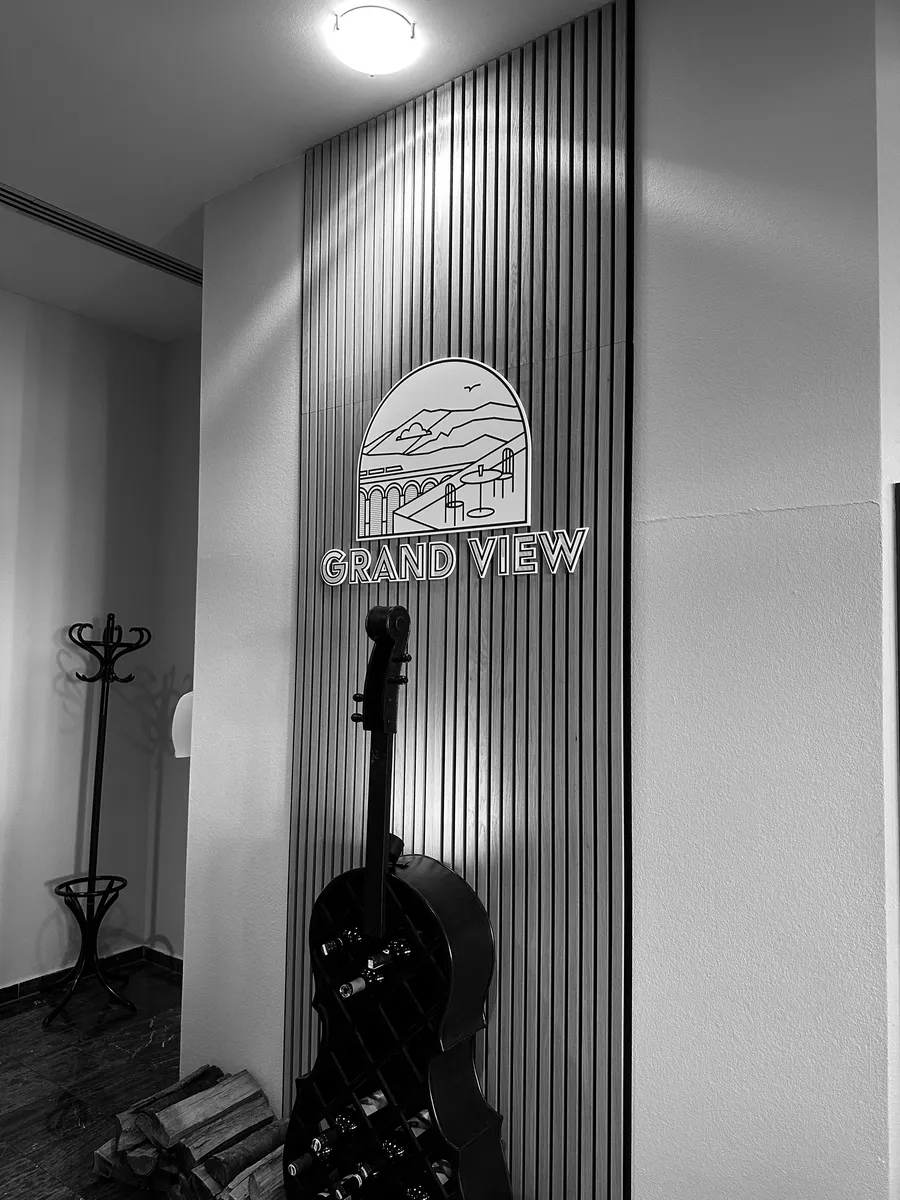 The Grand View sign on the restaurant wall